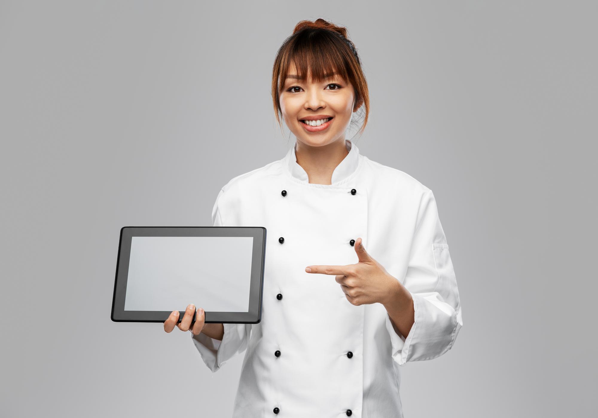 Chef teaching with futuristic kitchen setup